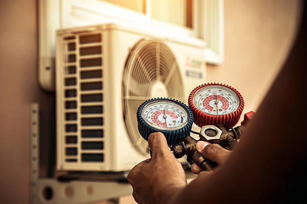 Professional Ductwork Repair technician working in Mantoloking, NJ